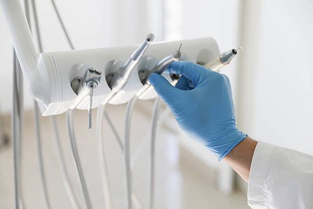 Professional Teeth Whitening technician working in Carle Place, NY